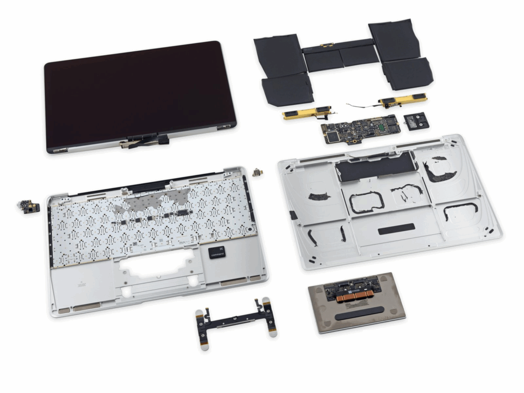MacBook teardown showing internal components including battery, motherboard, keyboard, and display – Dead or Alive Technology, Wishaw laptop repair specialists